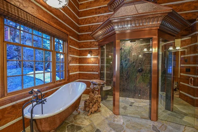 a view of a room with lots of furniture and racks