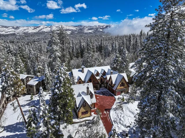a view of balcony with wooden floor and outdoor seating