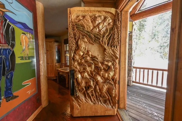 a view of a door and a window