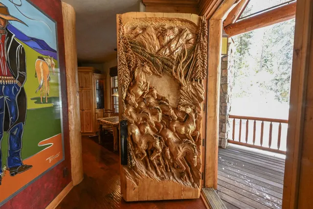 a view of a door and a window