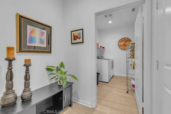 a view of entryway with wooden floor