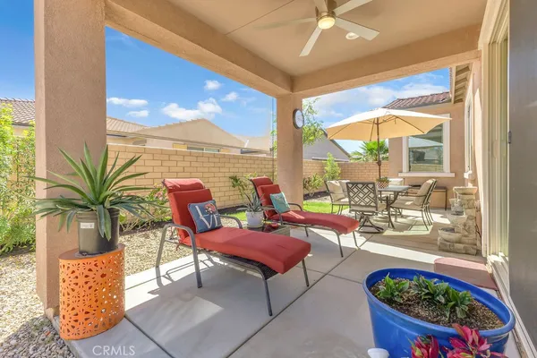 a building outdoor space with patio furniture