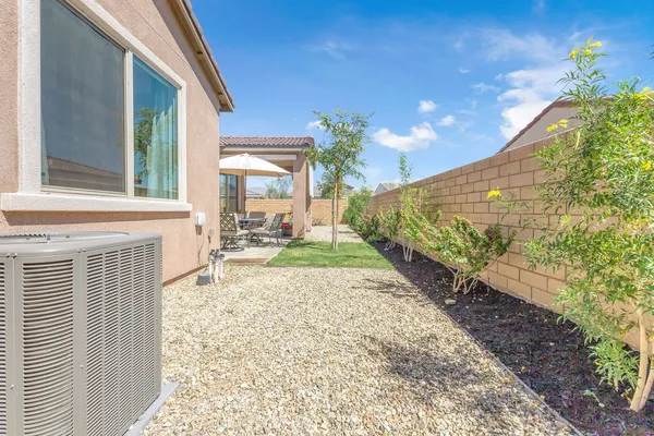 a view of a backyard with a garden