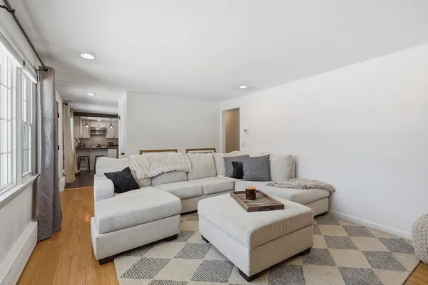 a living room with furniture and a couch