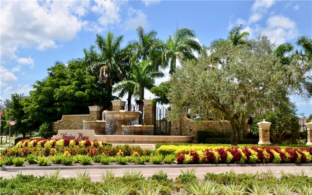9560 Trevi Court, Unit 4815 Naples, FL 34113 - Photo 28 of 38 a view of a garden with flowers
