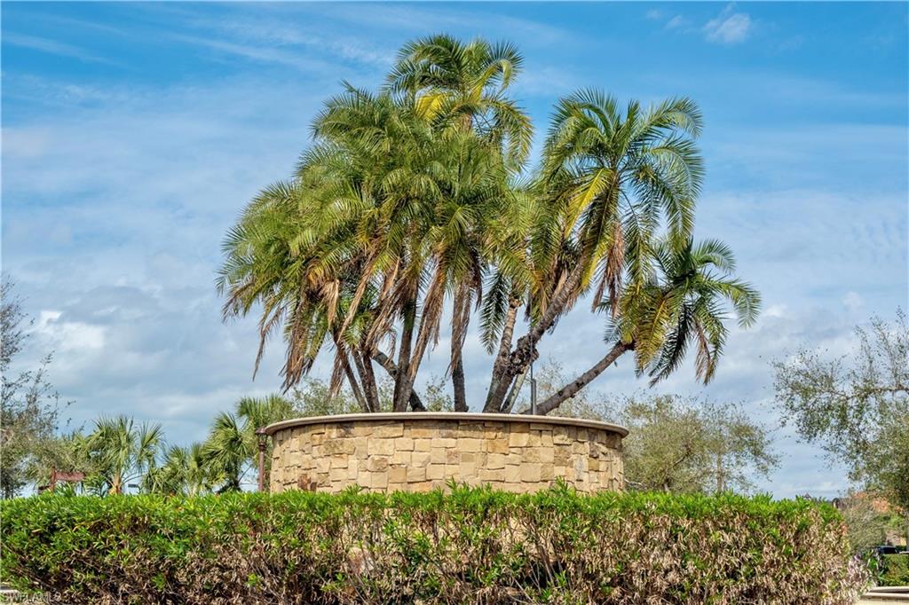 9560 Trevi Court, Unit 4815 Naples, FL 34113 - Photo 32 of 38 a view of a yard