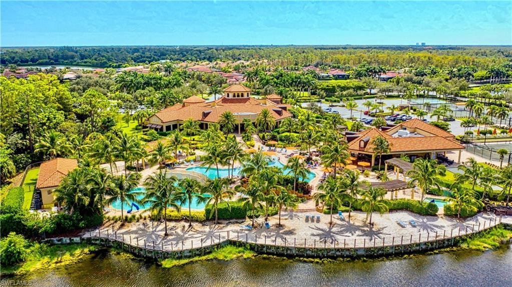 9560 Trevi Court, Unit 4815 Naples, FL 34113 - Photo 35 of 38 an aerial view of residential houses with outdoor space