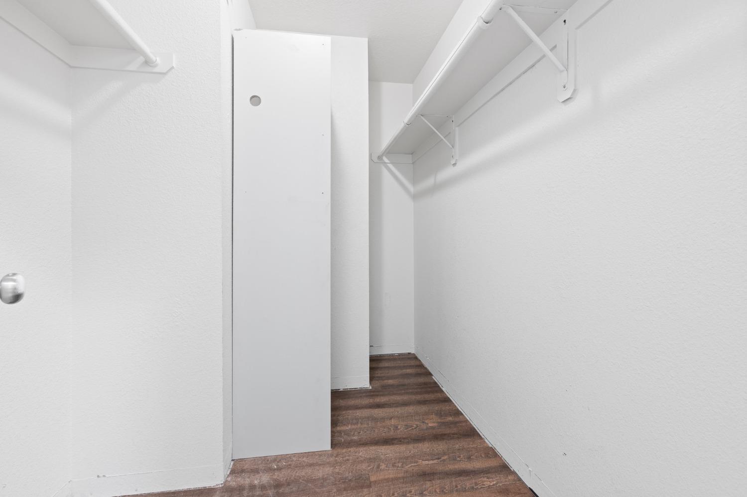 2242 Harvard Avenue Clovis, CA 93612 - Photo 27 of 34 a view of a hallway with wooden floor