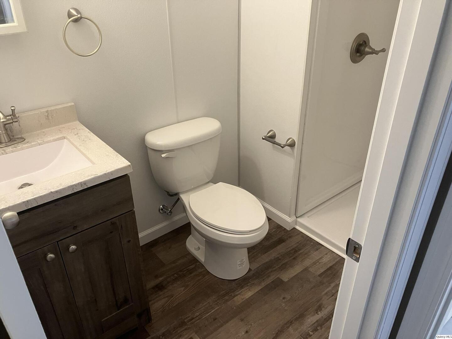 2525 Larch Road Quincy, IL 62301 - Photo 15 of 21 a bathroom with a toilet and a sink