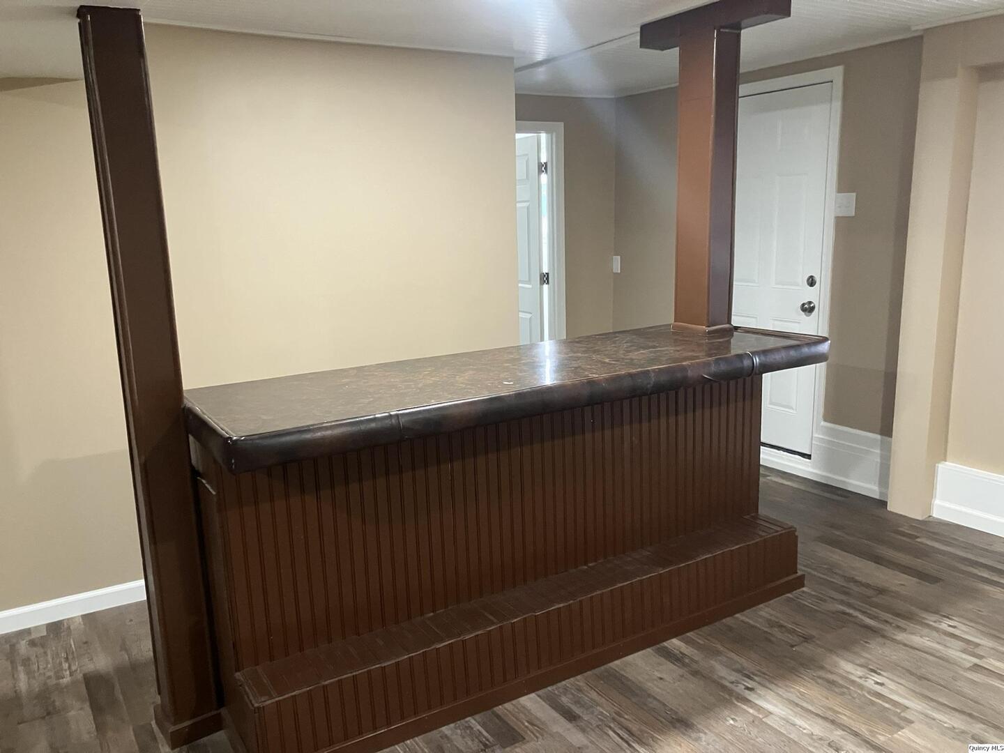 2525 Larch Road Quincy, IL 62301 - Photo 16 of 21 a view of kitchen cabinets and wooden floor