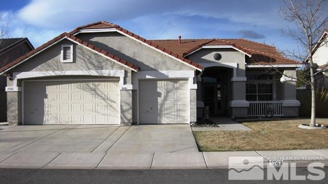 1743 Colavita Way Reno, NV 89521 - Photo 1 of 1 a front view of a house with a yard
