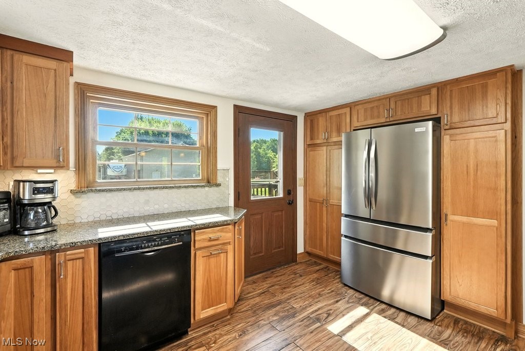 482 Industry Road Atwater, OH 44201 - Photo 23 of 43 Extra cabinetry! Door leads to back porch.