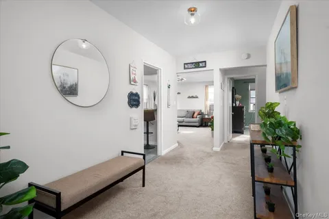 a view of livingroom with furniture and entryway