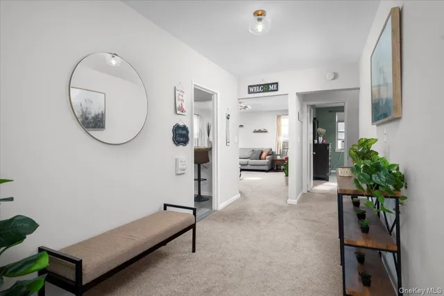 a view of livingroom with furniture and entryway