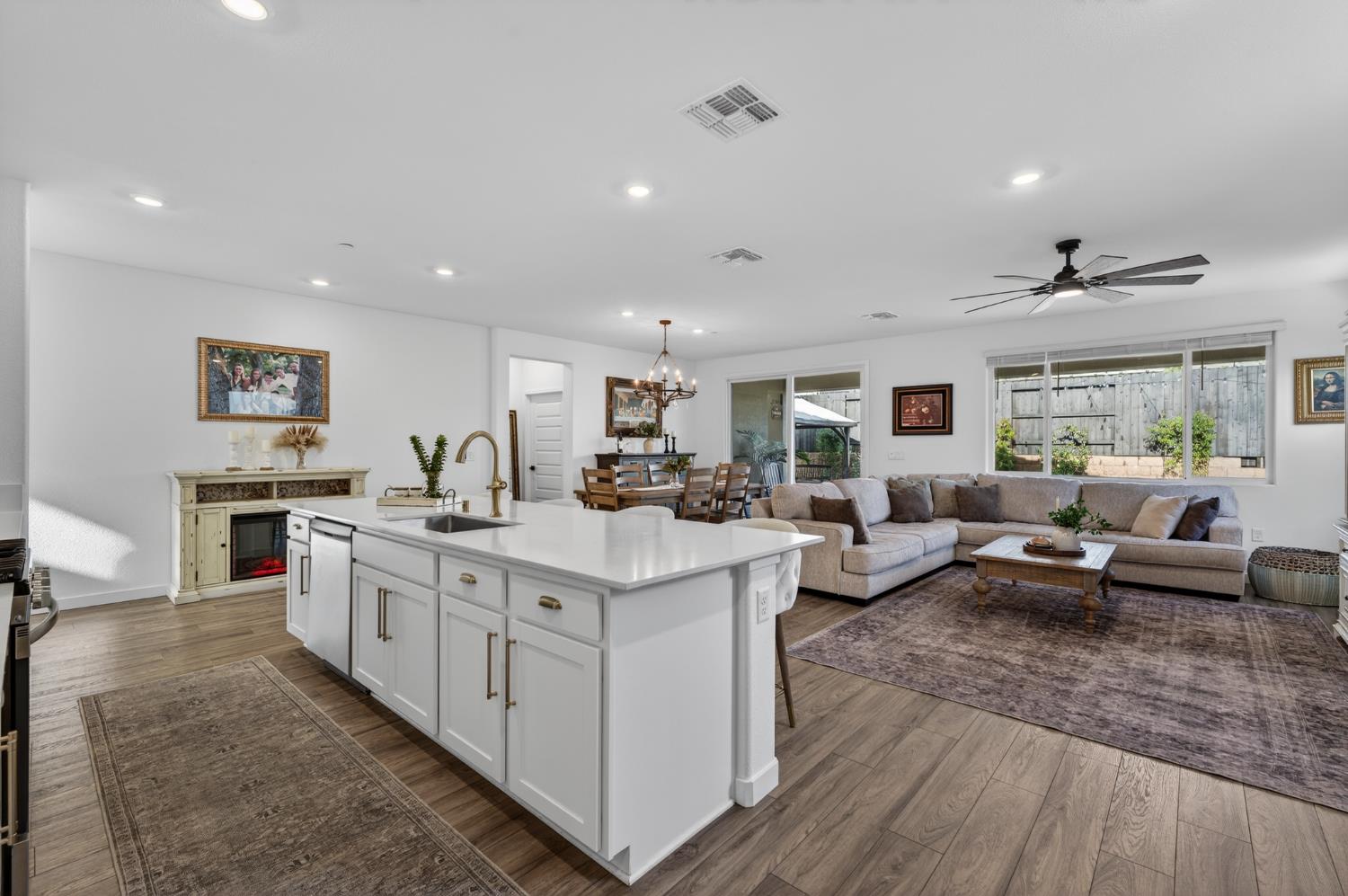4498 Duckhawk Circle Rancho Cordova, CA 95742 - Photo 17 of 61 a living room with furniture and view of kitchen