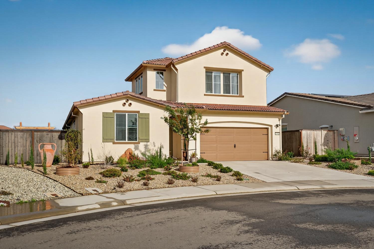 4498 Duckhawk Circle Rancho Cordova, CA 95742 - Photo 2 of 61 a front view of a house with a yard