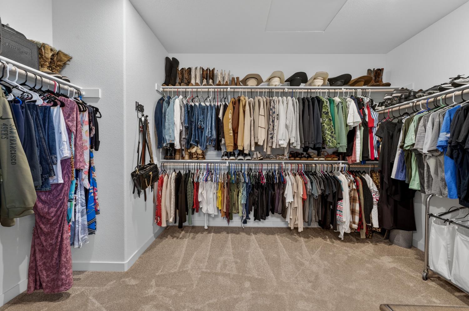 4498 Duckhawk Circle Rancho Cordova, CA 95742 - Photo 23 of 61 a view of walk in closet with clothes
