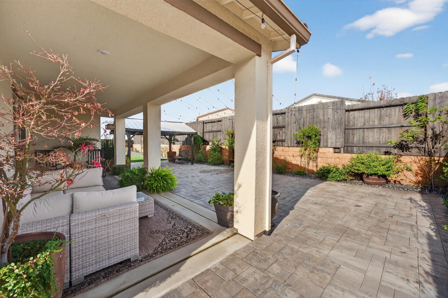 4498 Duckhawk Circle Rancho Cordova, CA 95742 - Photo 34 of 61 a view of a porch with potted plants