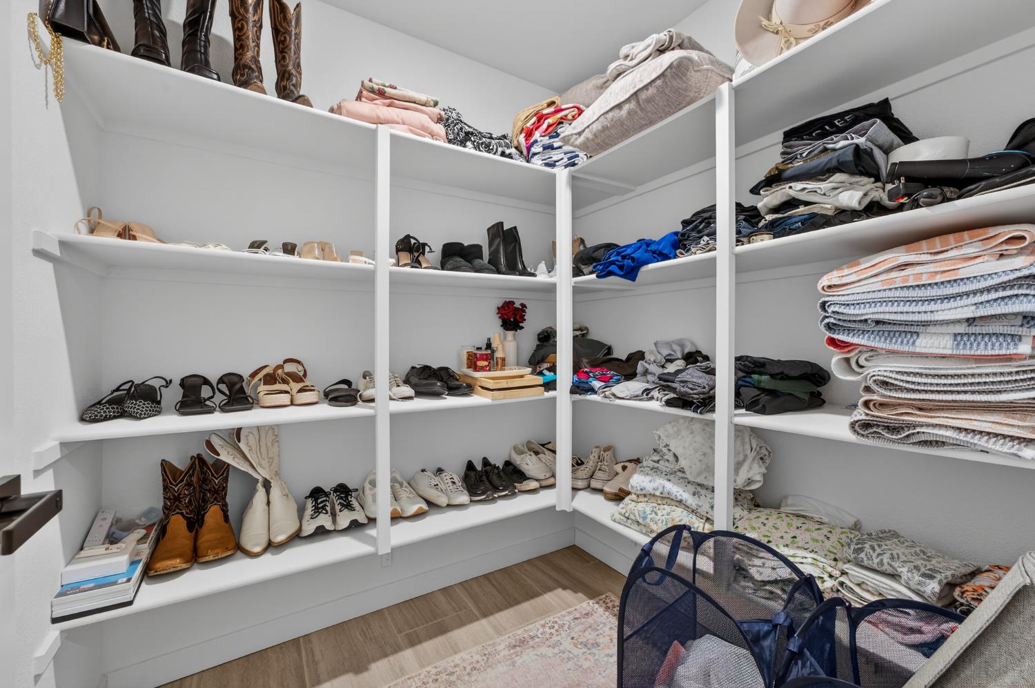 4498 Duckhawk Circle Rancho Cordova, CA 95742 - Photo 44 of 61 a view of walk in closet with clothes and shoes