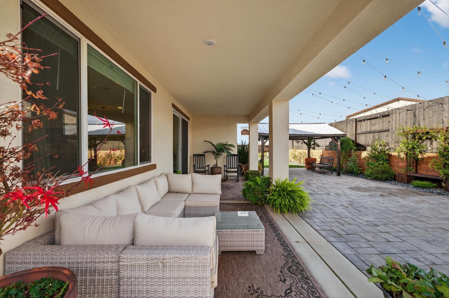 4498 Duckhawk Circle Rancho Cordova, CA 95742 - Photo 5 of 61 a living room with furniture and a potted plant