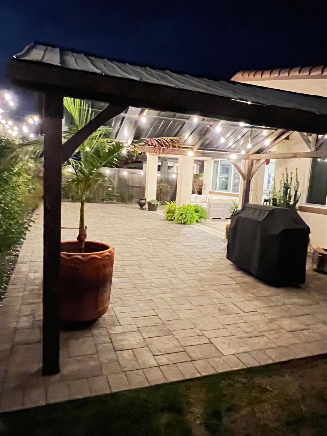 4498 Duckhawk Circle Rancho Cordova, CA 95742 - Photo 59 of 61 a living room with a couch and a fireplace