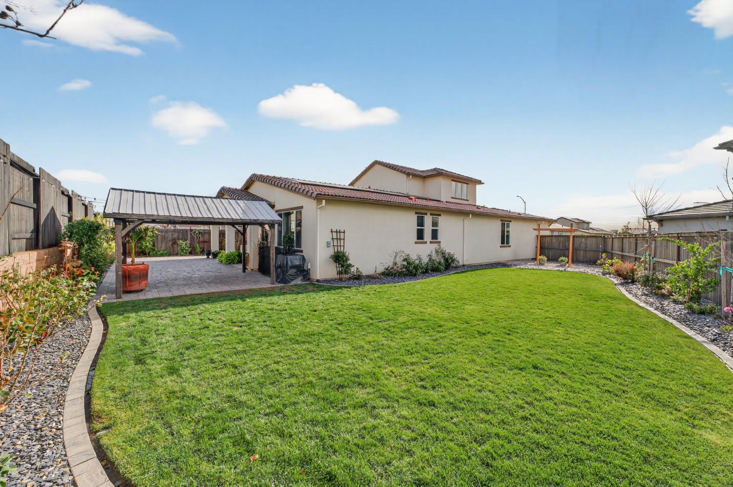 4498 Duckhawk Circle Rancho Cordova, CA 95742 - Photo 6 of 61 a view of a house with backyard and garden