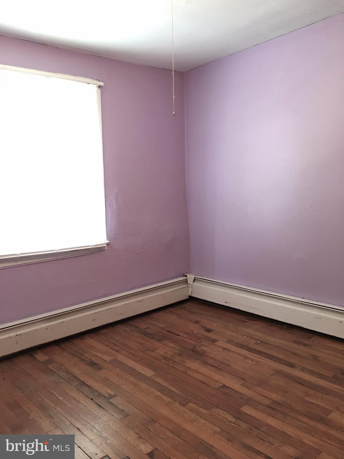 232 North Clear Ridge Road Union Bridge, MD 21791 - Photo 22 of 25 a view of a small space with wooden floor and a window