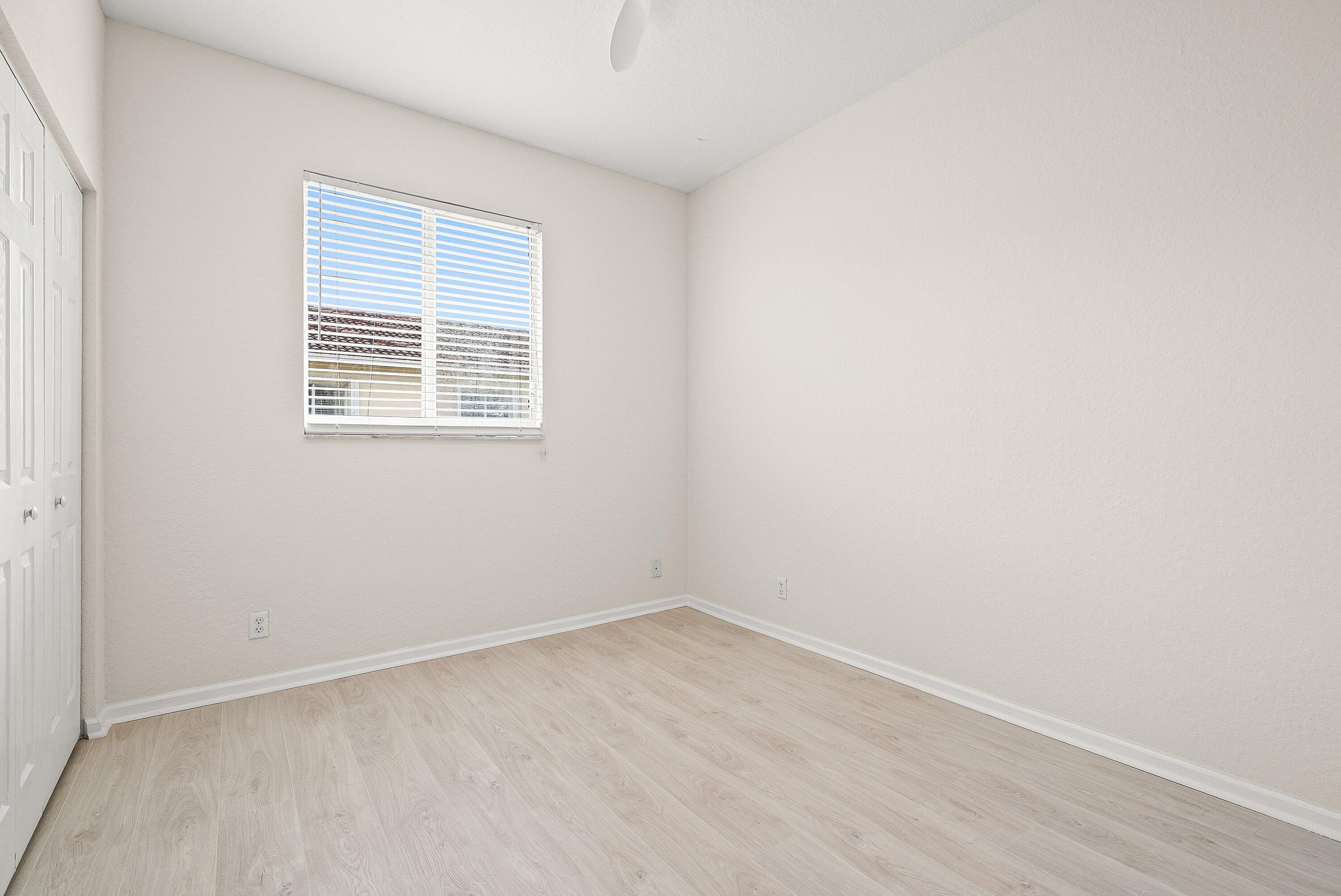 3187 North Oasis Drive Boynton Beach, FL 33426 - Photo 15 of 41 an empty room with a window