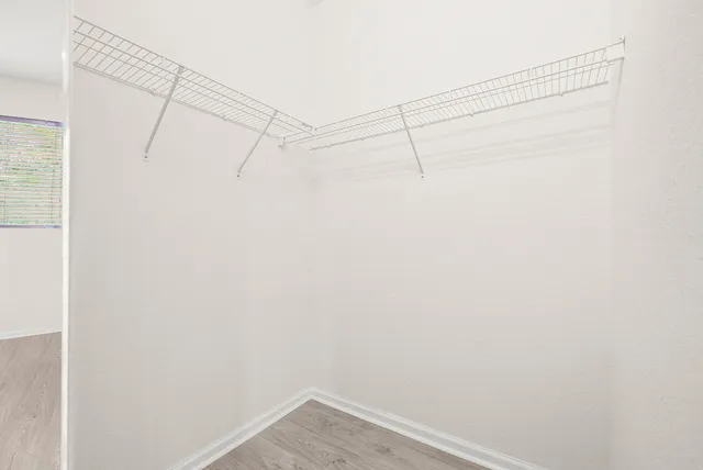 a view of a room with racks on the wall