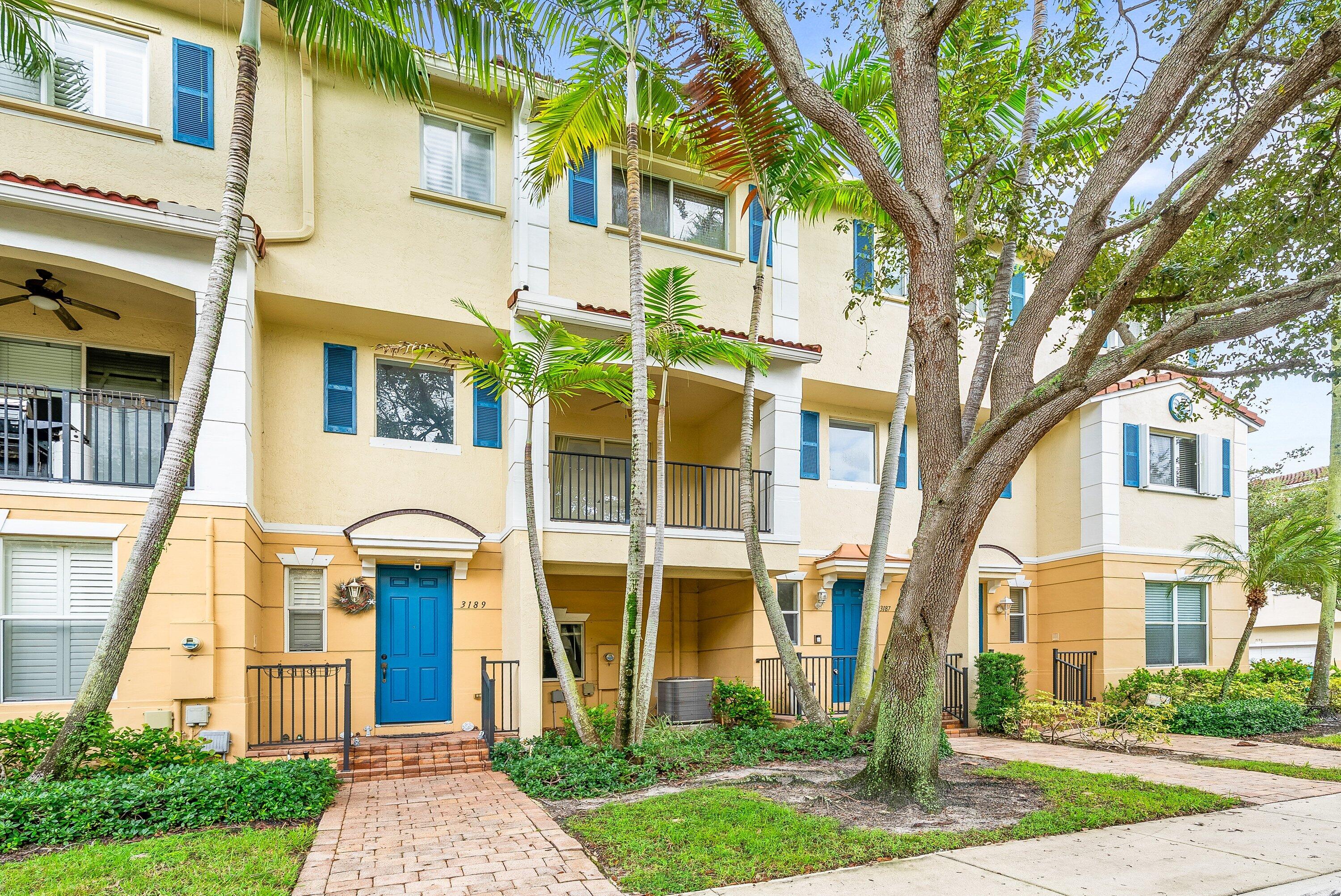 3187 North Oasis Drive Boynton Beach, FL 33426 - Photo 2 of 41 a front view of a building