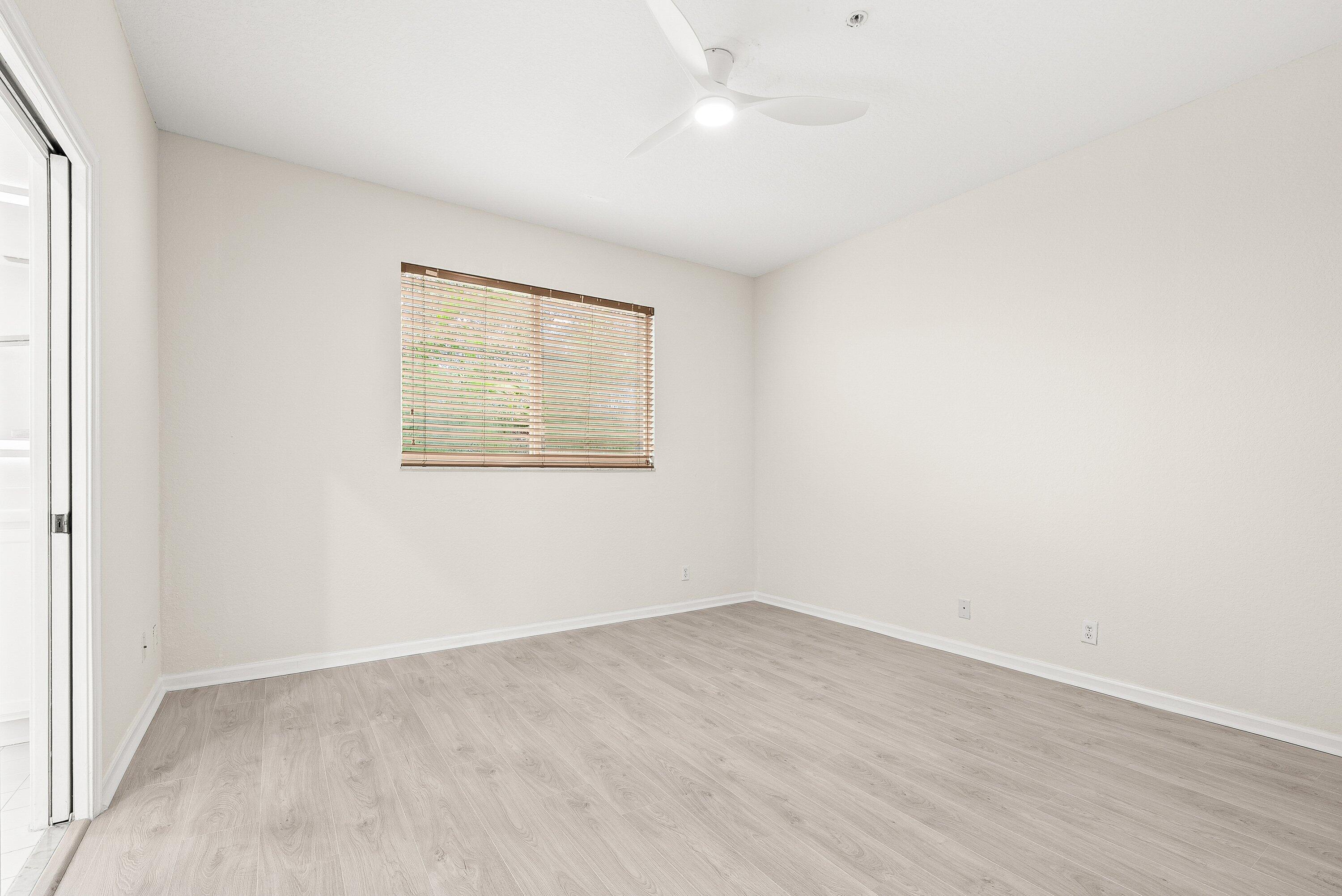 3187 North Oasis Drive Boynton Beach, FL 33426 - Photo 21 of 41 an empty room with a window