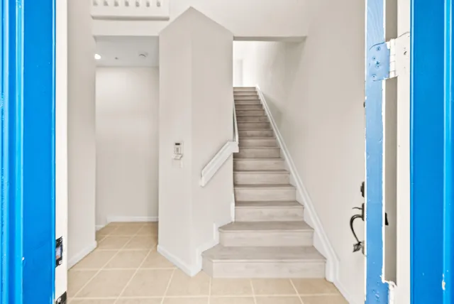 a view of an entryway with staircase