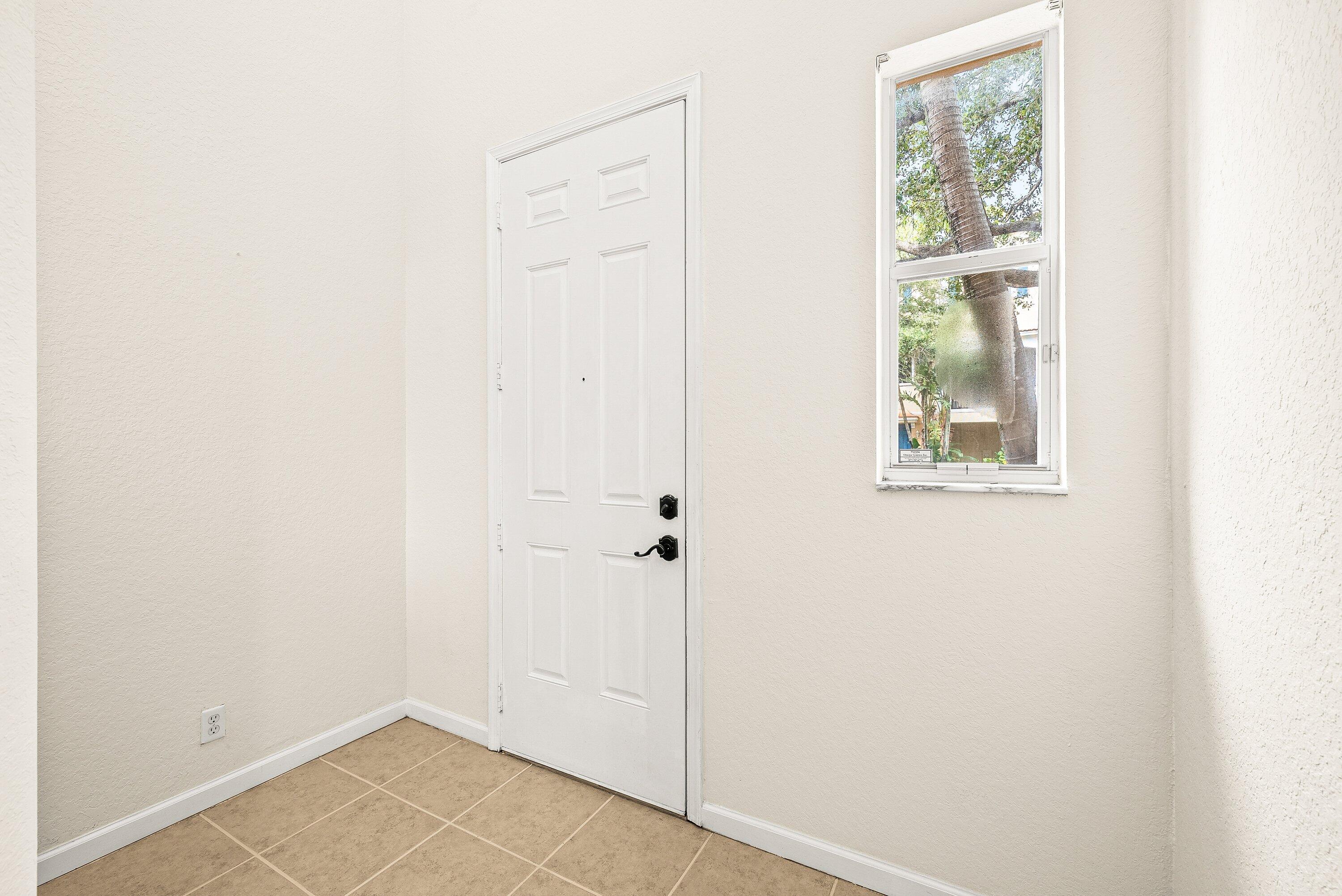 3187 North Oasis Drive Boynton Beach, FL 33426 - Photo 4 of 41 a view of an empty room with closet