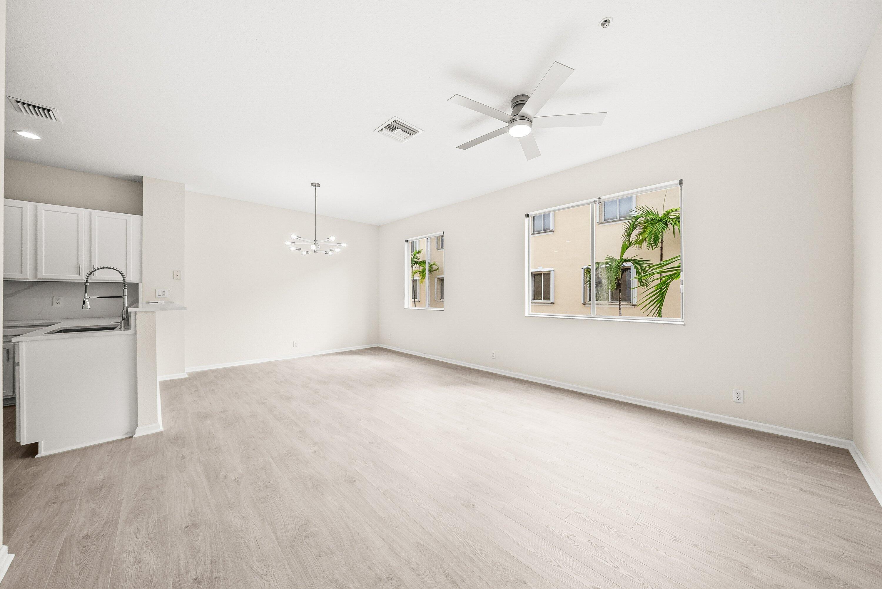 3187 North Oasis Drive Boynton Beach, FL 33426 - Photo 5 of 41 a view of an empty room with a window