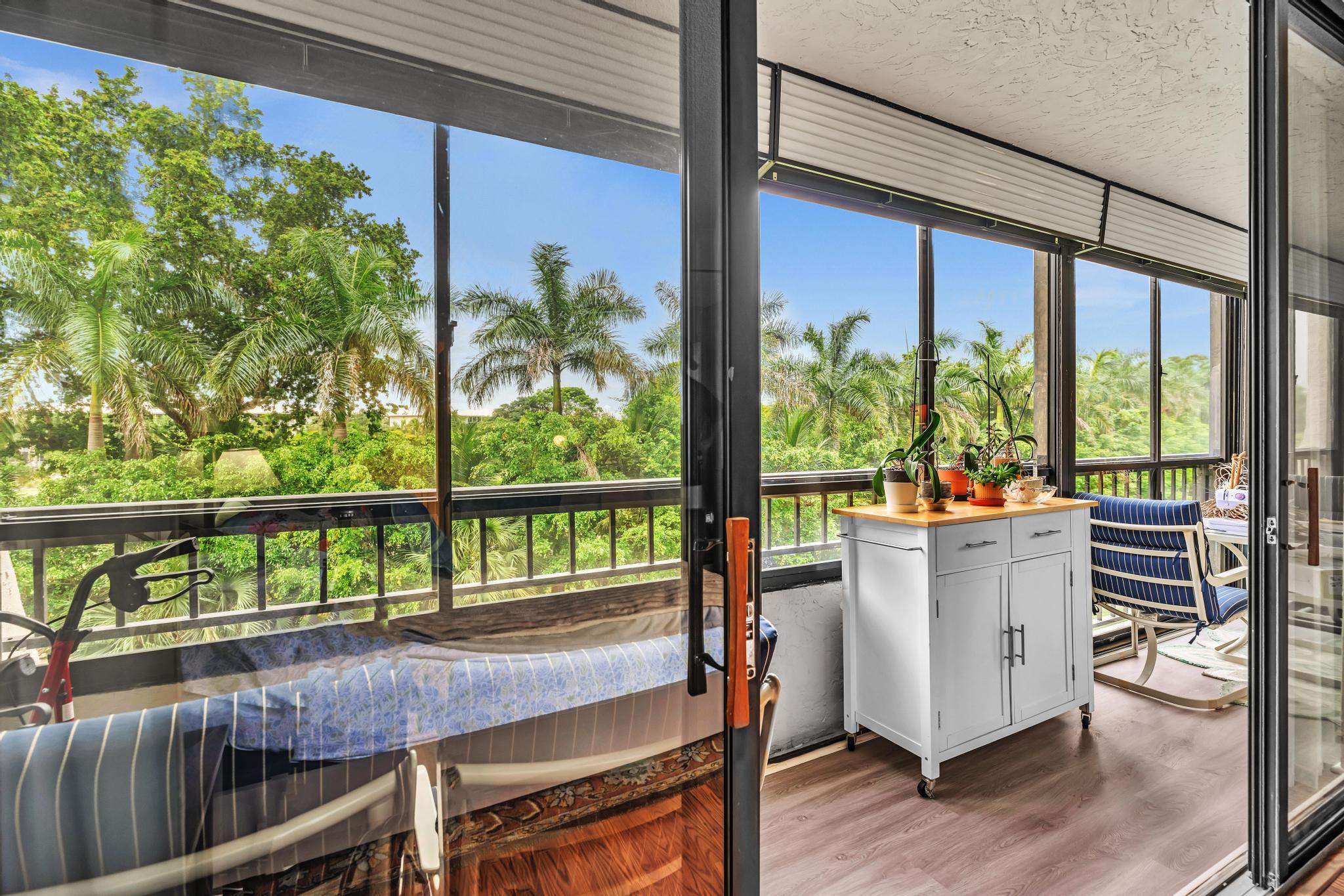 6320 Boca Del Mar Drive, Unit 303 Boca Raton, FL 33433 - Photo 17 of 42 a view of deck with furniture and garden