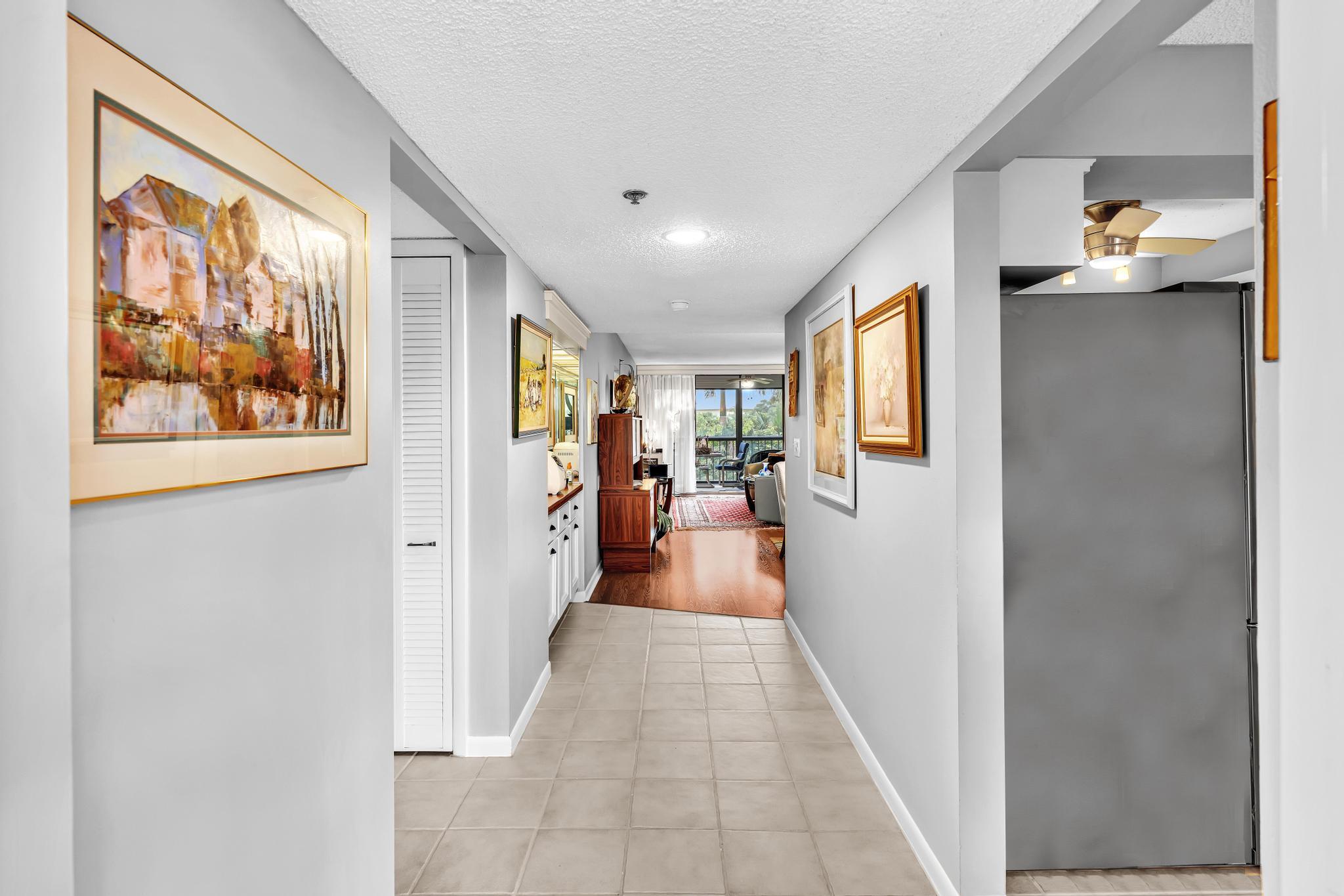 6320 Boca Del Mar Drive, Unit 303 Boca Raton, FL 33433 - Photo 3 of 42 a view of a hallway view with furniture and windows