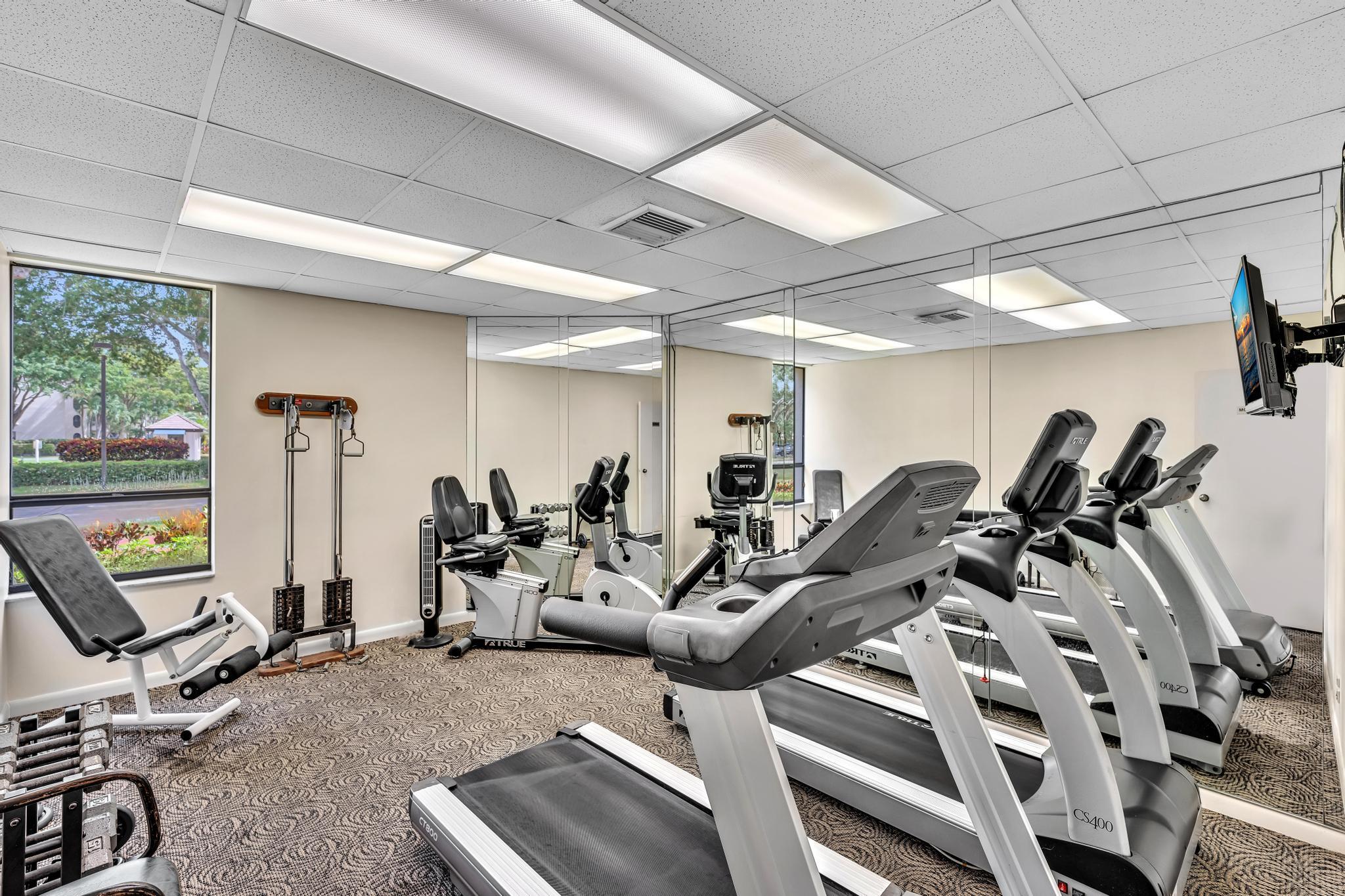 6320 Boca Del Mar Drive, Unit 303 Boca Raton, FL 33433 - Photo 36 of 42 a view of a room with gym equipment