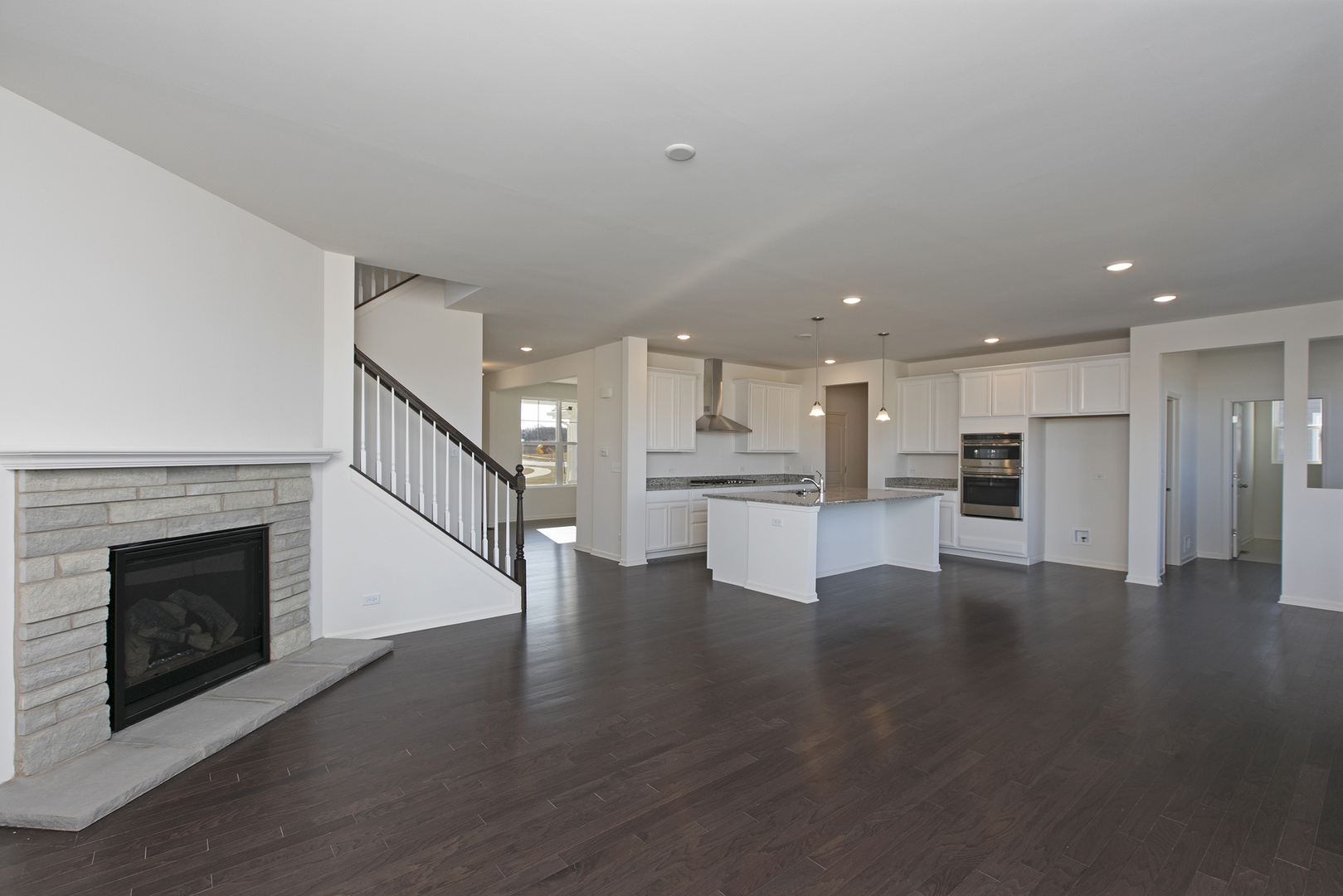 4382 John Milton Road Elgin, IL 60124 - Photo 8 of 42 a view of kitchen with cabinets and wooden floor