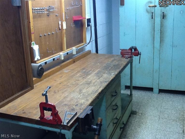 9850 West Pleasant Valley Road Parma, OH 44130 - Photo 11 of 15 Workshop (18x6) is FABULOUS and was a heavily used commodity in this house. Loads of room to create new or repair things in need.... a very handy spot to have in a home!!
