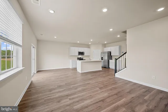 a view of kitchen with wooden floor