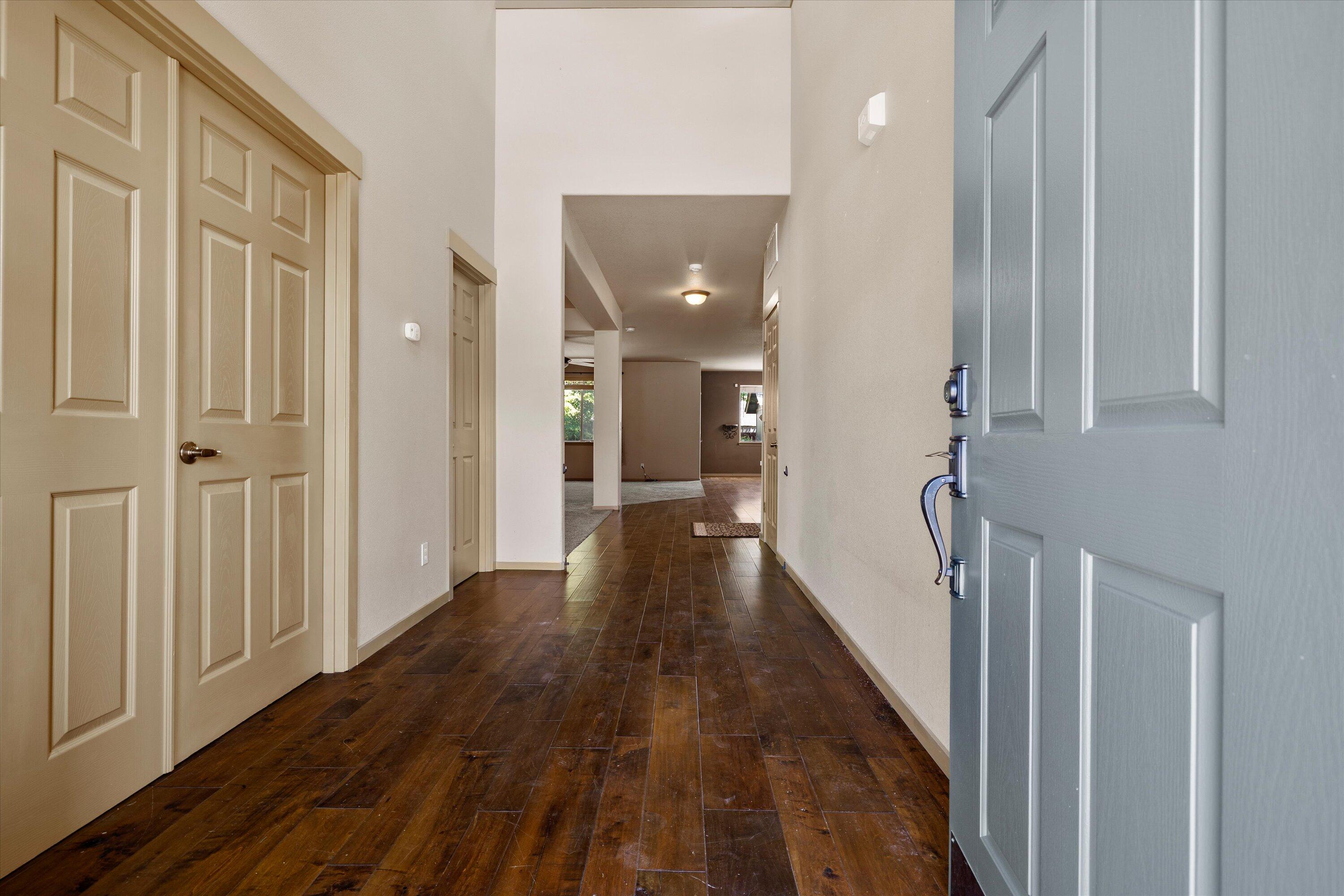 21190 Ritz Place Bend, OR 97702 - Photo 2 of 24 Nice entry with newer wood floors throughout