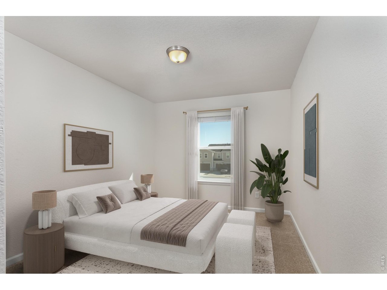610 Stonebridge Drive Longmont, CO 80503 - Photo 18 of 30 a bedroom with a large bed and a window