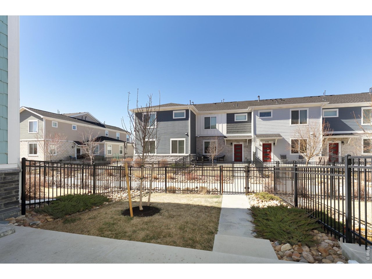 610 Stonebridge Drive Longmont, CO 80503 - Photo 26 of 30 a view of a house with backyard porch and sitting area
