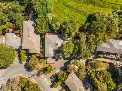 an aerial view of residential house with parking space