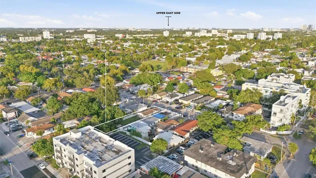 an aerial view of residential building with parking space