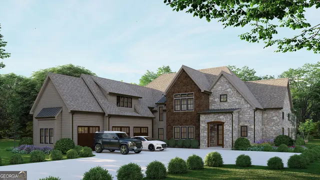 a front view of a house with garden and parking