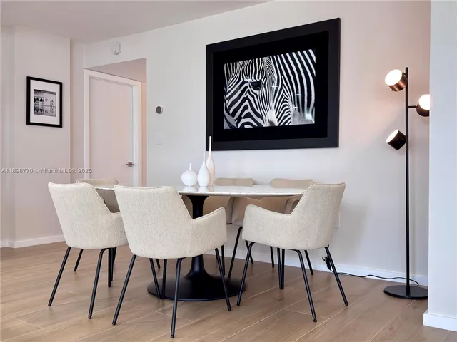 a view of a dining room with furniture