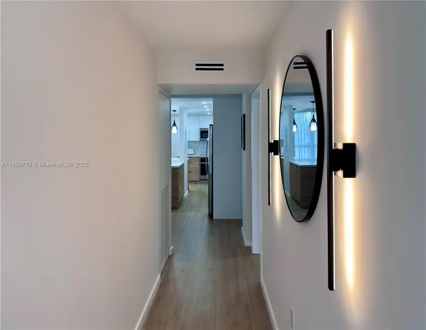 a view of a mirror and small space