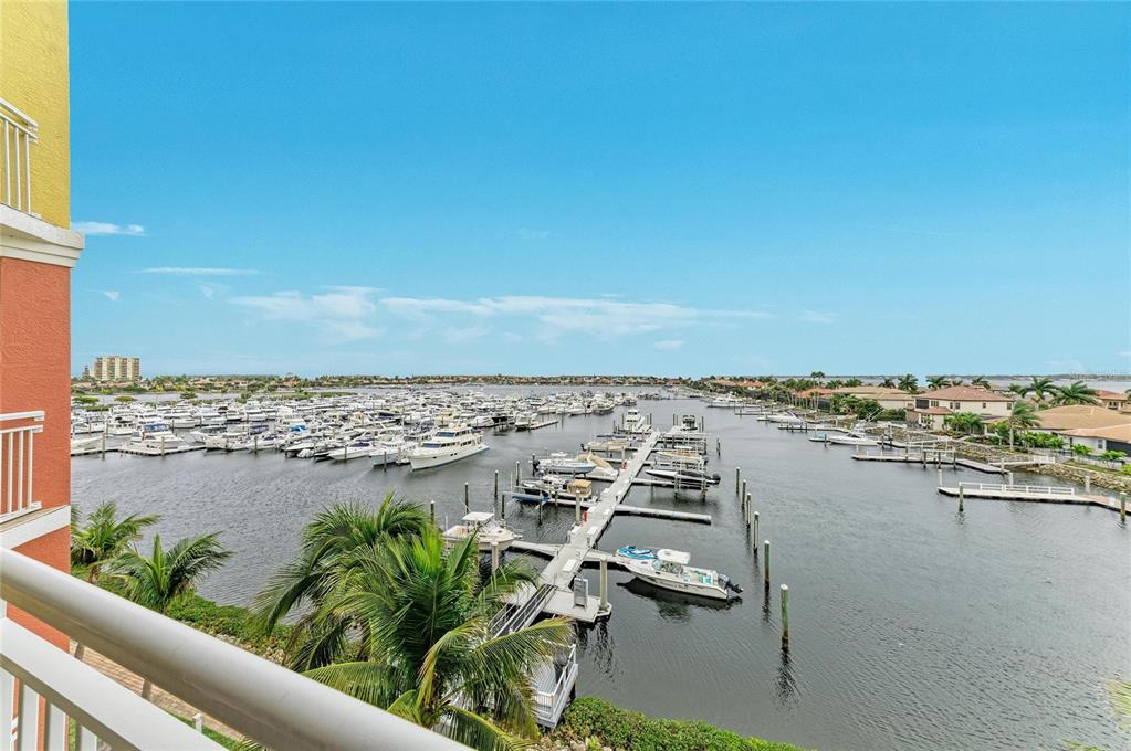 610 Riviera Dunes Way, Unit 406 Palmetto, FL 34221 - Photo 33 of 49 a view of a lake with outdoor space