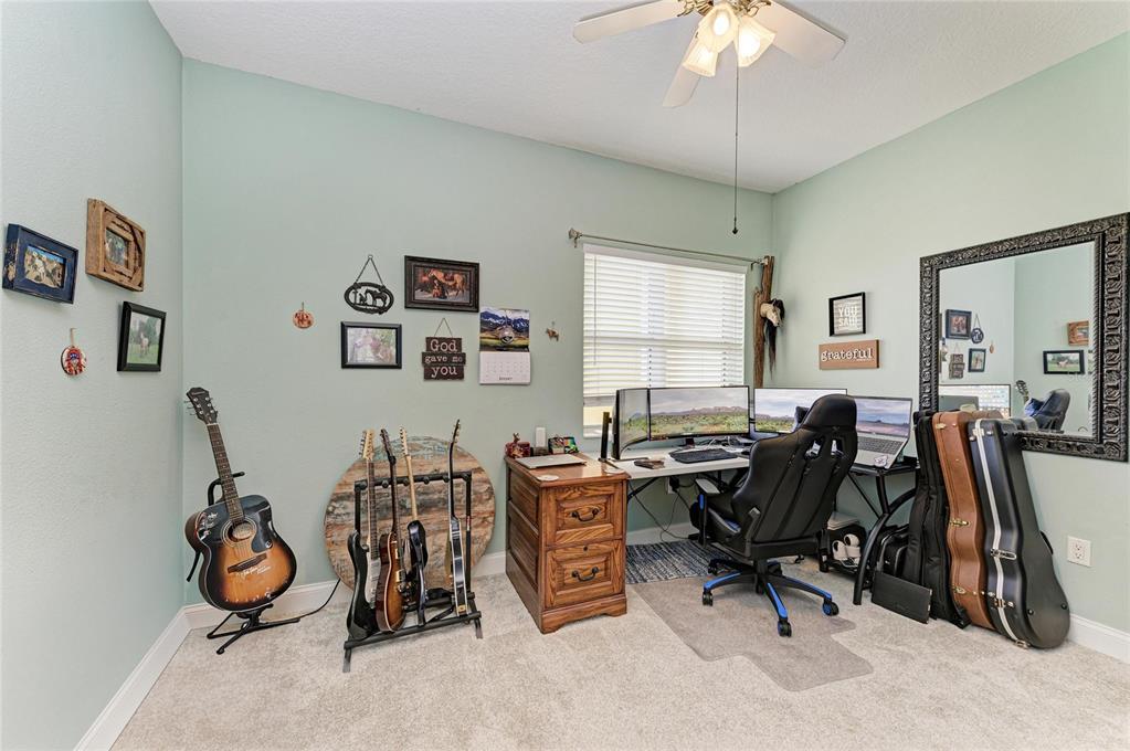610 Riviera Dunes Way, Unit 406 Palmetto, FL 34221 - Photo 36 of 49 a view of a room with gym equipment